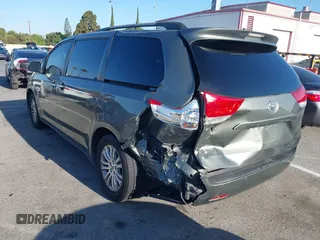 2011 Toyota Sienna XLE AAS with VIN 5TDYK3DC6BS072856, listed as a IAAI auction lot 42684298 with 113,202 mi miles and . Bid and sale history available at DreamBid. Image 3.