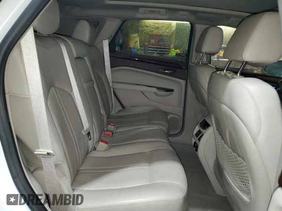 2013 Cadillac SRX Premium Collection с VIN 3GYFNJE35DS549948, выставлен на аукционе Copart как лот 45654295 с пробегом 79 793 миль миль и Чистый • Clean title. История ставок и продаж доступна на DreamBid. Изображение 11.