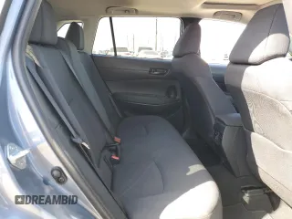 2023 Toyota Corolla Cross LE z VIN 7MUBAABG8PV045934, wystawiony jako Copart lot #52174075 z przebiegiem 11 378 mil mil oraz Szkody całkowita. Historia ofert i sprzedaży dostępna na DreamBid. Obrazek 11.