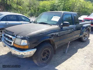 1998 Ford Ranger XL with VIN 1FTYR14U1WTA60680, listed as a IAAI auction lot 42033028 with 257,483 mi miles. Bid and sale history available at carsss.com. Image 2.