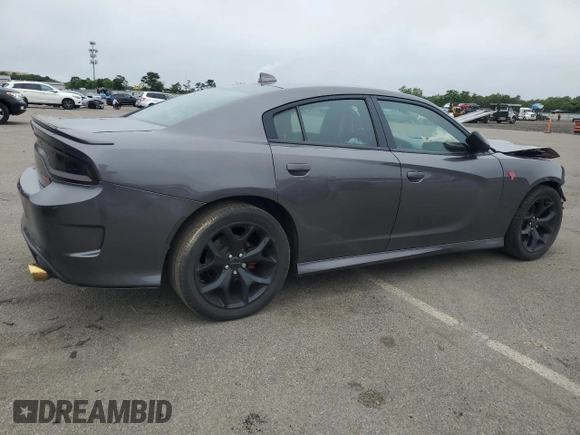 2016 Dodge Charger R/T with VIN 2C3CDXCT3GH298103, listed as a Copart auction lot 61351185 with 61,648 mi miles and Salvage title. Bid and sale history available at DreamBid. Image 3.