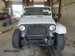 2016 Jeep Wrangler Unlimited Sahara with VIN 1C4BJWEGXGL310499, listed as a Copart auction lot 59756015 with 128,498 mi miles and Salvage title. Bid and sale history available at DreamBid. Image 5.