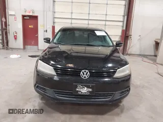 2014 Volkswagen Jetta SE with VIN 3VWD17AJ7EM409189, listed as a IAAI auction lot 42313804 with 139,950 mi miles and . Bid and sale history available at DreamBid. Image 12.