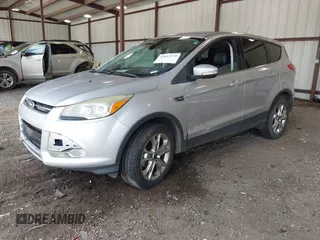 2013 Ford Escape SEL z VIN 1FMCU9HX0DUB99150, wystawiony jako IAAI lot #42812971 z przebiegiem 212 298 mil mil oraz . Historia ofert i sprzedaży dostępna na DreamBid. Obrazek 2.