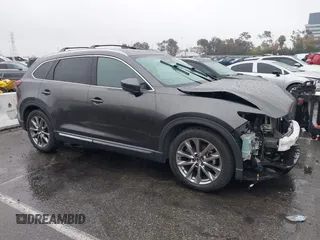 2019 Mazda CX-9 Grand Touring with VIN JM3TCADY4K0315095, listed as a IAAI auction lot 41573317 with 64,635 mi miles. Bid and sale history available at carsss.com. Image 14.