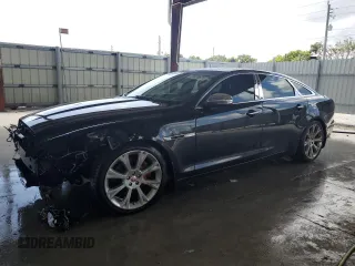 2014 Jaguar XJ with VIN SAJWA2GZ4E8V60864, listed as a Copart auction lot 76478674 with 50,578 mi miles and Salvage Title. Bid and sale history available at carsss.com. Image 1.