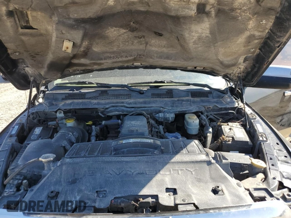 2011 Ram 2500 Laramie Longhorn z VIN 3D7UT2CLXBG604668, wystawiony jako Copart lot #52128635 z przebiegiem 479 971 mil mil oraz Szkoda całkowita • Salvage title. Historia ofert i sprzedaży dostępna na DreamBid. Obrazek 13.