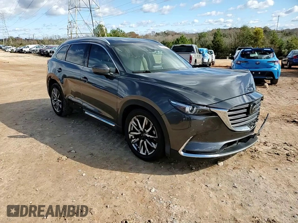 2017 Mazda CX-9 Grand Touring z VIN JM3TCADY8H0138866, wystawiony jako Copart lot #80894184 z przebiegiem Nie podano mil oraz Szkoda całkowita • Salvage title. Historia ofert i sprzedaży dostępna na DreamBid. Obrazek 12.