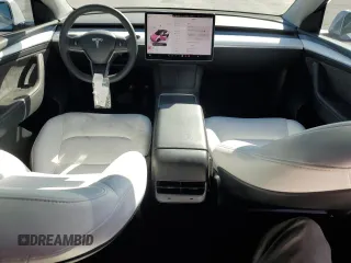 2024 Tesla Model Y with VIN 7SAYGDED3RF130826, listed as a Copart auction lot 47735185 with 10,467 mi miles and Non Repairable. Bid and sale history available at DreamBid. Image 8.