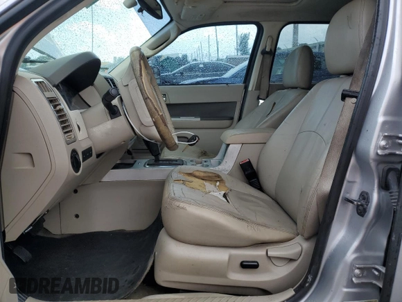 2010 Mercury Mariner Premier with VIN 4M2CN8HG3AKJ06165, listed as a Copart auction lot 50501905 with 229,937 mi miles and Salvage title. Bid and sale history available at DreamBid. Image 7.