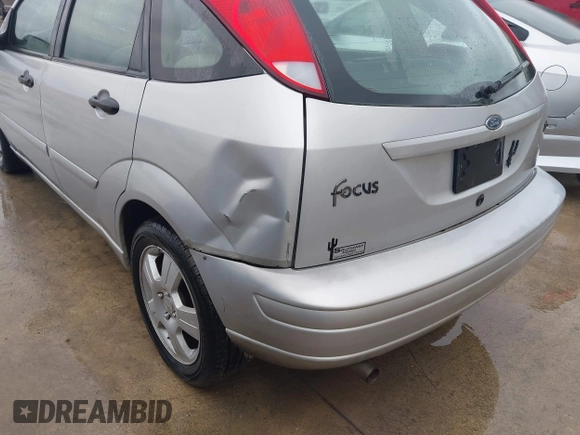 2004 Ford Focus with VIN 3FAFP37Z54R127432, listed as a IAAI auction lot 41586056 with 159,927 mi miles and . Bid and sale history available at DreamBid. Image 6.