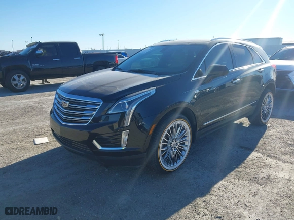 2017 Cadillac XT5 FWD with VIN 1GYKNARS3HZ122969, listed as a IAAI auction lot 41421230 with 116,603 mi miles. Bid and sale history available at carsss.com. Image 19.