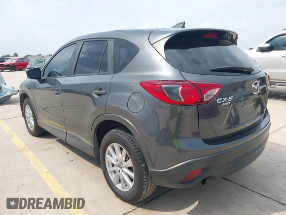 2016 Mazda CX-5 Sport with VIN JM3KE4BY8G0921243, listed as a IAAI auction lot 42102663 with 111,960 mi miles and . Bid and sale history available at DreamBid. Image 3.