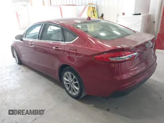 2019 Ford Fusion Hybrid SE with VIN 3FA6P0LUXKR205712, listed as a IAAI auction lot 41267049 with 124,687 mi miles. Bid and sale history available at carsss.com. Image 3.