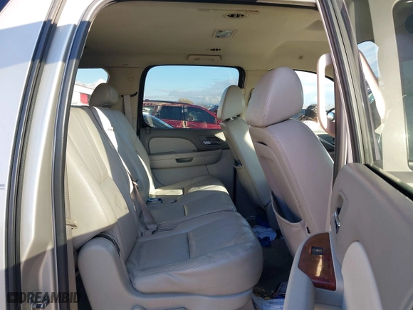 2009 Chevrolet Suburban LT w/2LT with VIN 1GNFC26099R177554, listed as a IAAI auction lot 38664519 with 311,063 mi miles. Bid and sale history available at carsss.com. Image 8.