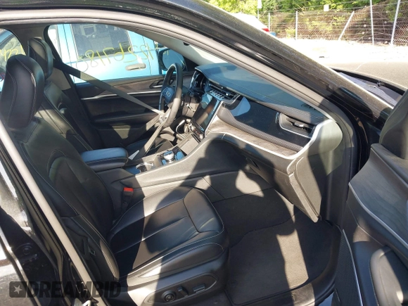 2023 Jeep Grand Cherokee with VIN 1C4RJYB68PC648859, listed as a IAAI auction lot 42267180 with 29,809 mi miles and . Bid and sale history available at DreamBid. Image 5.