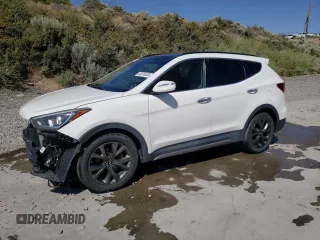2018 Hyundai Santa Fe Ultimate with VIN 5XYZWDLA7JG543861, listed as a Copart auction lot 61870335 with 104,796 mi miles and Salvage title. Bid and sale history available at DreamBid. Image 1.