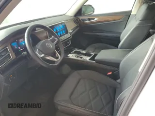 2024 Volkswagen Atlas SE with VIN 1V2HR2CA2RC556331, listed as a IAAI auction lot 42806429 with 25,239 mi miles and . Bid and sale history available at DreamBid. Image 3.