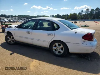 2003 Ford Taurus SES Standard with VIN 1FAFP55213G168356, listed as a Copart auction lot 73246854 with 212,786 mi miles and Salvage Title. Bid and sale history available at DreamBid. Image 2.