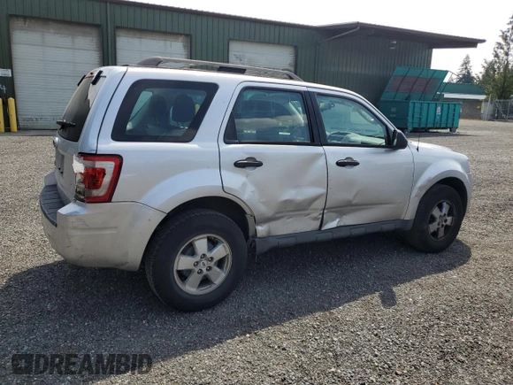 2011 Ford Escape XLS z VIN 1FMCU0C75BKA71501, wystawiony jako Copart lot #62614335 z przebiegiem 130 210 mil mil oraz Szkoda całkowita • Salvage title. Historia ofert i sprzedaży dostępna na DreamBid. Obrazek 3.