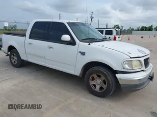 2003 Ford F-150 XLT with VIN 1FTRW07623KD58824, listed as a IAAI auction lot 42124403 with 1 mi miles. Bid and sale history available at carsss.com. Image 1.