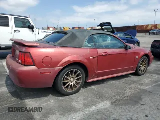 2004 Ford Mustang Deluxe с VIN 1FAFP44614F132348, выставлен на аукционе Copart как лот 60098855 с пробегом 161 683 миль миль и Чистый • Clean title. История ставок и продаж доступна на DreamBid. Изображение 3.