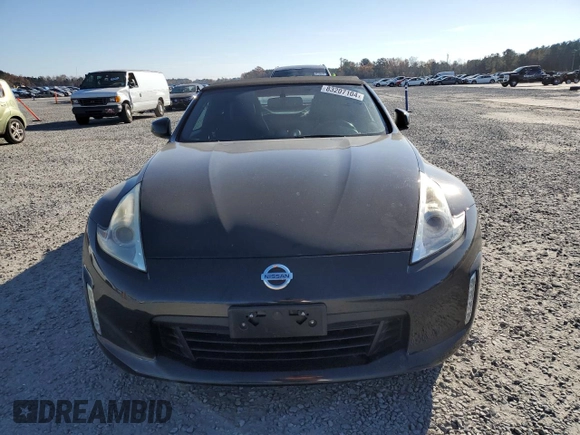 2014 Nissan 370Z Touring with VIN JN1AZ4FH3EM620195, listed as a Copart auction lot 83207104 with 66,974 mi miles and Salvage Title. Bid and sale history available at DreamBid. Image 5.