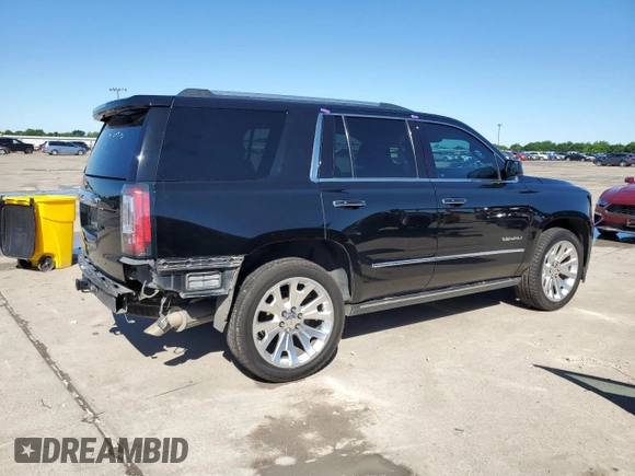 2015 GMC Yukon Denali z VIN 1GKS1CKJ8FR748131, wystawiony jako Copart lot #55213205 z przebiegiem 101 758 mil mil oraz Szkoda całkowita • Salvage title. Historia ofert i sprzedaży dostępna na DreamBid. Obrazek 3.