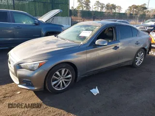 2015 Infiniti Q50 Premium z VIN JN1BV7AR2FM423666, wystawiony jako IAAI lot #41345228 z przebiegiem 67 027 mil mil oraz . Historia ofert i sprzedaży dostępna na DreamBid. Obrazek 2.