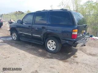 2004 Chevrolet Tahoe LT with VIN 1GNEC13Z84R209220, listed as a IAAI auction lot 41867643 with 385,229 mi miles. Bid and sale history available at carsss.com. Image 3.