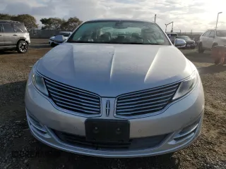 2014 Lincoln MKZ with VIN 3LN6L2JKXER806539, listed as a Copart auction lot 42724215 with 104,283 mi miles and Salvage title. Bid and sale history available at DreamBid. Image 5.