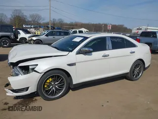 2015 Ford Taurus SEL z VIN 1FAHP2E86FG202386, wystawiony jako IAAI lot #42061925 z przebiegiem 123 475 mil mil oraz . Historia ofert i sprzedaży dostępna na DreamBid. Obrazek 6.