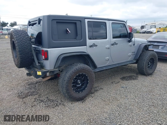 2018 Jeep Wrangler Unlimited Sport S with VIN 1C4BJWDG4JL861052, listed as a IAAI auction lot 42100517 with 43,907 mi miles and . Bid and sale history available at DreamBid. Image 4.