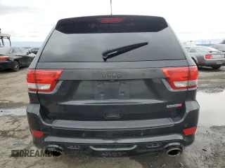 2012 Jeep Grand Cherokee SRT8 with VIN 1C4RJFDJ4CC350907, listed as a Copart auction lot 49409205 with 171,352 mi miles and Clean Title. Bid and sale history available at carsss.com. Image 6.