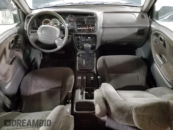 2002 Chevrolet Tracker LT z VIN 2CNBJ634126949974, wystawiony jako Copart lot #54819695 z przebiegiem 200 895 mil mil oraz Szkoda całkowita • Salvage title. Historia ofert i sprzedaży dostępna na DreamBid. Obrazek 8.