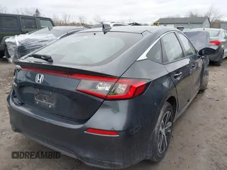 2024 Honda Civic LX z VIN 19XFL2H5XRE023870, wystawiony jako IAAI lot #41776260 z przebiegiem Nie podano mil oraz . Historia ofert i sprzedaży dostępna na DreamBid. Obrazek 4.