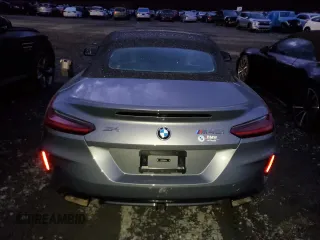 2024 BMW Z4 sDriveM40i with VIN WBAHF9C02RWY35106, listed as a Copart auction lot 82878254 with 3,199 mi miles and Salvage Title. Bid and sale history available at carsss.com. Image 6.