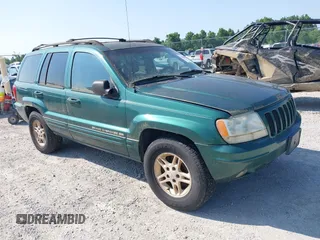 1999 Jeep Grand Cherokee Limited with VIN 1J4GW68N5XC630910, listed as a IAAI auction lot 42380978 with 188,300 mi miles and . Bid and sale history available at DreamBid. Image 1.