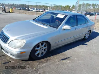2004 Mercedes-Benz S-Class 5.0L with VIN WDBNG84J74A403779, listed as a IAAI auction lot 41346259 with 224,485 mi miles. Bid and sale history available at carsss.com. Image 2.