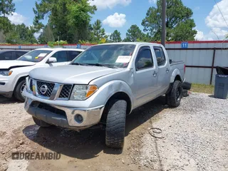 2008 Nissan Frontier SE with VIN 1N6AD07W58C409914, listed as a IAAI auction lot 42433581 with 202,534 mi miles and . Bid and sale history available at DreamBid. Image 2.