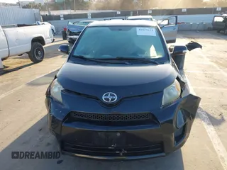 2011 Scion xD with VIN JTKKU4B46B1009909, listed as a IAAI auction lot 41959824 with 185,764 mi miles. Bid and sale history available at carsss.com. Image 12.