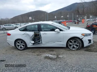 2019 Ford Fusion Hybrid SEL with VIN 3FA6P0MU3KR189612, listed as a IAAI auction lot 41422745 with 95,130 mi miles. Bid and sale history available at carsss.com. Image 13.