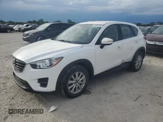 2016 Mazda CX-5 Sport with VIN JM3KE2BY0G0729349, listed as a Copart auction lot 62469735 with 88,247 mi miles and Salvage title. Bid and sale history available at DreamBid. Image 1.