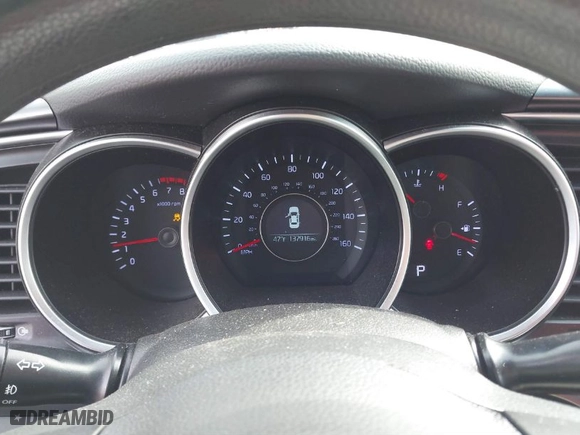 2015 Kia Optima LX with VIN KNAGM4A74F5601538, listed as a IAAI auction lot 41650956 with 137,916 mi miles. Bid and sale history available at carsss.com. Image 7.