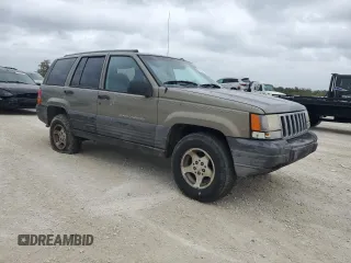 1998 Jeep Grand Cherokee Laredo with VIN 1J4GZ58S6WC137968, listed as a Copart auction lot 84083454 with 0 mi miles and Non Repairable. Bid and sale history available at carsss.com. Image 4.
