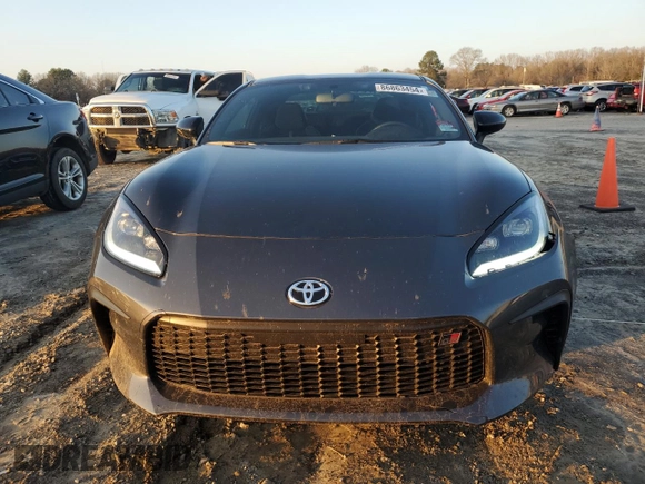 2024 Toyota GR86 Premium with VIN JF1ZNBE17R9751729, listed as a Copart auction lot 86863454 with 11,909 mi miles and Salvage Title. Bid and sale history available at carsss.com. Image 5.