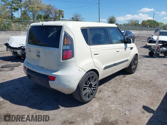 2010 Kia Soul + with VIN KNDJT2A24A7044597, listed as a IAAI auction lot 41798936 with 152,707 mi miles. Bid and sale history available at carsss.com. Image 4.