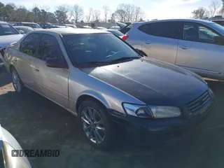 1997 Toyota Camry LE z VIN JT2BF22K2V0072674, wystawiony jako IAAI lot #41463665 z przebiegiem Nie podano mil oraz . Historia ofert i sprzedaży dostępna na DreamBid. Obrazek 1.