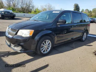 2018 Dodge Grand Caravan SXT with VIN 2C4RDGCG8JR300082, listed as a Copart auction lot 55357765 with 119,444 mi miles and Salvage Title. Bid and sale history available at DreamBid. Image 1.