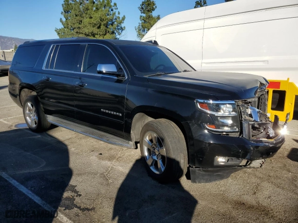 2017 Chevrolet Suburban Premier with VIN 1GNSCJKC3HR126011, listed as a Copart auction lot 87095354 with 122,437 mi miles and Clean Title. Bid and sale history available at carsss.com. Image 4.